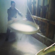 Watching the rice being filtered at Ferron, Pila Vecia